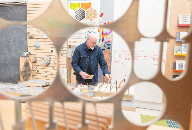 Photo of a professor teaching a class at the UConn Storrs campus.